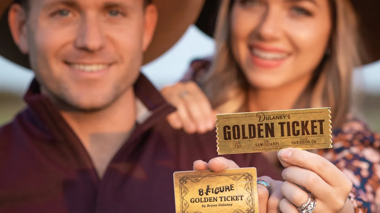 Bryan and Stephanie Dulaney holding Dulaney's Golden Ticket and the 8 Figure Golden Ticket USB