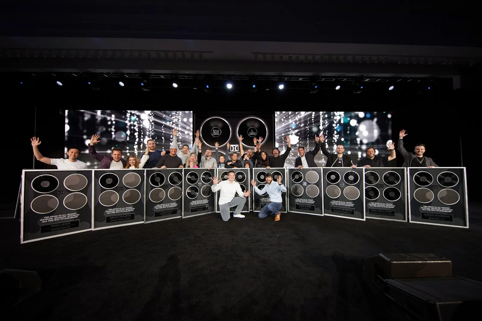 The ClickFunnels Award of All Awards class on stage with their plaques